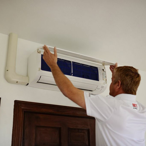 Mini Split system being serviced in home